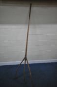 A LARGE PRIMITIVE STYLE HAY FORK, with three prongs and metal banding, length 248cm x width 63cm,