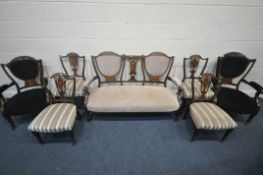 AN EDWARDIAN MAHOGANY AND ROSEWOOD SEVEN PIECE PARLOUR SUITE, comprising a sofa, with two backrests,
