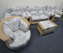 A FIVE PIECE RATTAN CONSERVATORY SUITE, comprising a two seater sofa, width 158cm x depth 90cm x