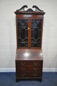 AN EDWARDIAN SHERATON REVIVAL MAHOGANY AND CROSS BANDED BUREAU BOOKCASE, with twin swan neck