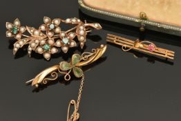THREE BROOCHES, the first a 9ct gold floral brooch, set with four circular cut tourmalines and