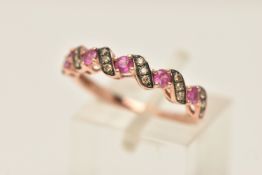A BOXED 'LE VIAN' RING, a rose metal band set with five circular cut rubies, each interspaced with