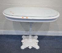 T GREEN AND SON, LEEDS, A WHITE PAINTED VICTORIAN CAST IRON TABLE BASE, with scrolled details,