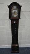 A TEMPUS FUGIT GRANDMOTHER CLOCK, the arched hood with a single door, that’s enclosing an 8 inch