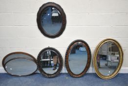 SIX OVAL WALL MIRRORS, varying in size, style, material, etc, largest mirror 87cm x 60cm,