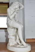 A COPELAND PARIAN SCULPTURE OF A FEMALE, possibly a nymph sat on rock waterside, pressed '