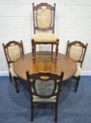 A LATE 20TH CENTURY OAK EXTENDING DINING TABLE, with a single fold out leaf, raised on a single