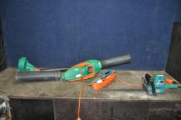 A BLACK AND DECKER GARDEN BLOWER/ VAC and a Black and Decker hedge trimmer (both current PAT sticker