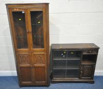 A LATE 20TH CENTURY OAK CORNER CUPBOARD, the double glass doors enclosing to glass shelves, over