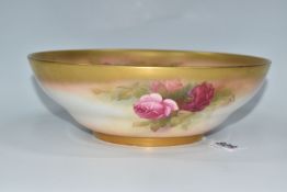 A ROYAL WORCESTER BOWL PAINTED WITH ROSES BY WALTER SEDGLEY, signed inside the rim 'Sedgley',