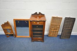 AN EDWARDIAN MAHOGANY CABINET, the single glass door enclosing four shelves, width 48cm x depth 41cm