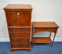 A REPRODUCTION YEW WOOD DRINKS CABINET, with a fall front door, that’s enclosing a glass shelf, a