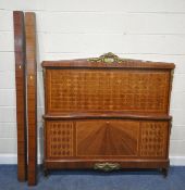 A LOUIS XVI STYLE WALNUT 5FT BEDSTEAD, with brass crest and mounts, parquetry patterns, a central