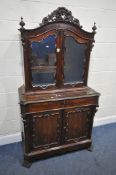 A 19TH CENTURY MAHOGANY SECRETAIRE BOOKCASE, with foliate scrolls decoration throughout, canted