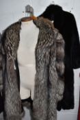 THREE FUR COATS comprising a grey fur coat and an embroidered 'STN' and floral pattern to the