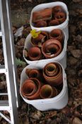 THREE TUBS CONTAINING NUMEROUS VINTAGE TERRACOTTA PLANT POTS, of varying sizes (20+)