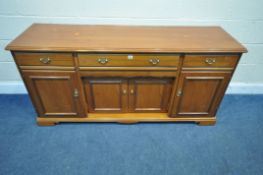 YOUNGER FURNITURE, A LATE 20TH CENTURY SIDEBOARD, fitted with three chairs, over four cupboard