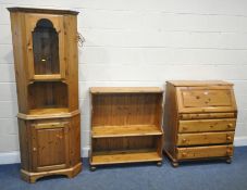 THE PIECES OF MODERN PINE FURNITURE, to include a bureau with three drawers, one key, an open