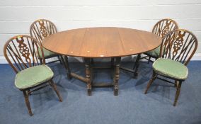 A LATE 20TH CENTURY OAK GATE LEG TABLE, raised on block and turned legs, united by stretchers,
