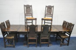 AN OAK BRETON DRAW LEAF DINING TABLE, with a parquetry top, on caryatid supports united by