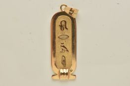 AN EGYPTIAN CARTOUCHE PENDANT, an oval form pendant with hieroglyphics, fitted with a tapered