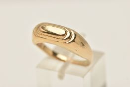 A YELLOW METAL RING, stepped signet design, unmarked metal, ring size P 1/2, approximate gross