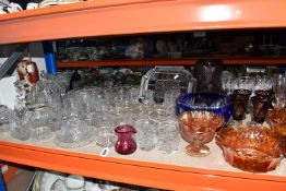 A QUANTITY OF CLEAR AND COLOURED GLASSWARE to include assorted crystal cut and pressed glass items