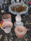 A CONCRETE BIRDBATH, with a balustered base and hexagonal top (crack to top and base), height