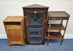 A 20TH CENTURY OAK CORNER CUPBOARD, with a single glass door, width 54cm x depth 30cm x height