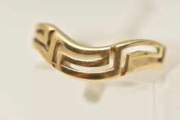 A YELLOW METAL RING, a shaped band ring with pierced detail, stamped 585, ring size H 1/2,