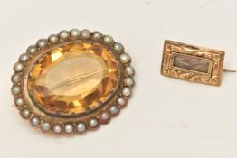 TWO BROOCHES, to include an oval yellow metal brooch set with an oval cut Citrine within a