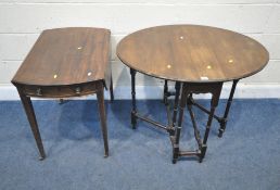 AN EARLY 20TH CENTURY MAHOGANY GATE LEG TABLE, raised on block and turned legs, united by
