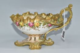 A LATE NINETEENTH/EARLY TWENTIETH CENTURY MOORE BROS SAUCEBOAT, with scrolling foot, foliate