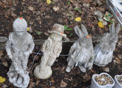 FOUR CONCRETE GARDEN FIGURES, including two caricature rabbits and two boys, rabbit heights 44cm