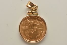 A MOUNTED 5 DOLLAR LIBERTY COIN PENDANT, a 1999 1/10 oz fine gold 5 dollars coin, mounted in a