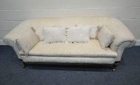 AN LATE 19TH / EARLY 20TH CENTURY AESTHETIC MOVEMENT CHESTERFIELD STYLE SOFA, with beige foliate