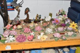 A COLLECTION OF DECORATIVE ORNAMENTS comprising a large quantity of continental flower ornaments and