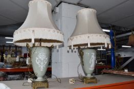 A PAIR OF CONTINENTAL 'PATE SUR PATE' TABLE LAMPS, of elongated ovoid form with classical motifs