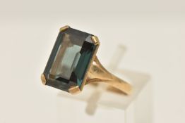 A 9CT GOLD GEM SET RING, a rectangular cut large green synthetic spinel, approximate length 14mm x