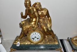 A GILT BRONZE FIGURAL MANTEL CLOCK, depicting a male and female figure in classical dress seated