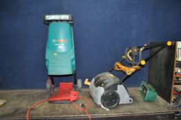 A BOSCH AXT RAPID 2000 GARDEN SHREDDER with two push sticks and a Titan lawn aerator with