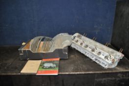 A JAGUAR 3.4 Mk2 RADIATOR GRILLE, cylinder head, Intereuropean workshop manual and a 2.4 Handbook