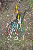 A COLLECTION OF GARDEN TOOLS, including a lawn sorter, spades, clippers, a tree popper, etc