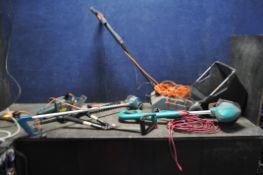 A COLLECTION OF GARDEN POWER TOOLS including a Bosch Combi trim strimmer, a Black and Decker