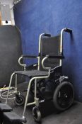 A KARMA MEDICAL WHEELCHAIR with two footrests
