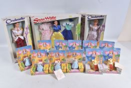 A COLLECTION OF BOXED DISNEY RELATED COLLECTABLES AND FIGURES, to include a Bikin Walt Disney 11 1/2