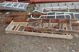 THREE VINTAGE WOODEN STEP LADDERS AND A METAL STEP LADDER, the tallest being 221cm. Condition