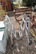 A COOPERS ALUMINIUM PLATFORM LADDER, with three joints for three uses, closed height 92cm