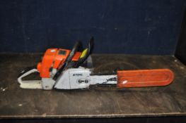 A STIHL 044 PETROL CHAIN SAW, with 18in cut (engine pulls freely but hasn't started)