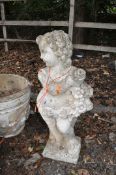 A CONCRETE GARDEN FIGURE, in the form of a boy holding flowers, height 80cm. Condition Report: no
